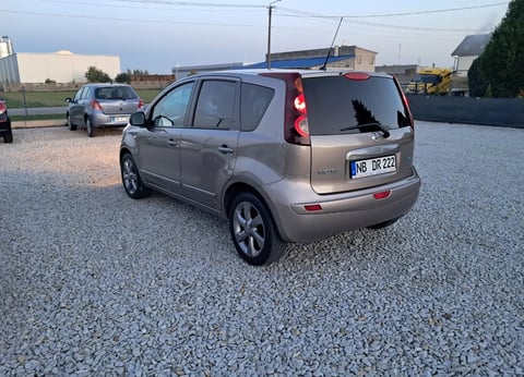 Silver Fiat minivan rear view